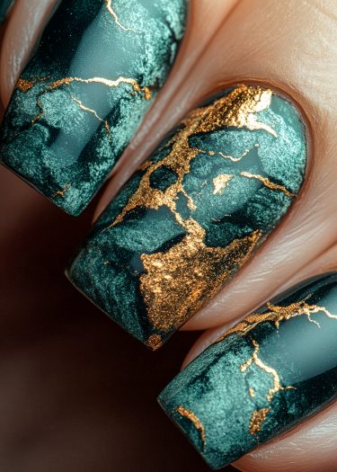 Elegant teal and gold marble nails featuring sophisticated art and rich color contrast.