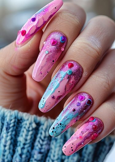 Vibrant almond-shaped nail art featuring intricate designs, glitter, and playful embellishments.