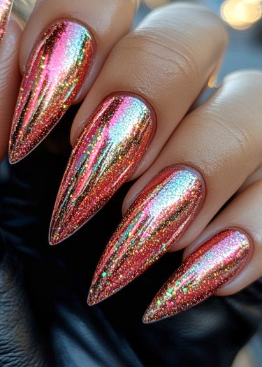 Stunning stiletto nails featuring vibrant multichromatic colors and glitter on smooth leather background.