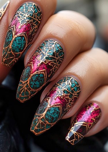 Elegant teal and magenta almond nails with intricate gold metallic designs and glossy finish.