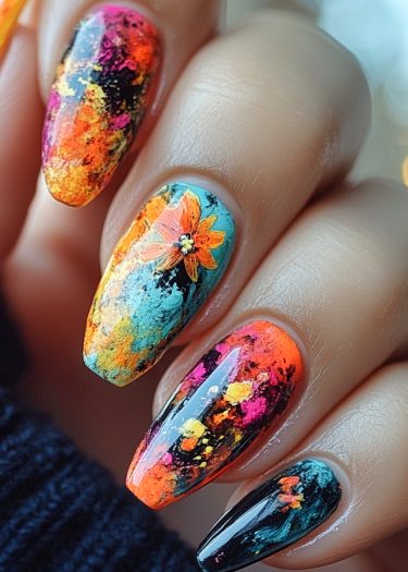 Vibrant nail art with almond shapes featuring colorful gradients and a floral design.