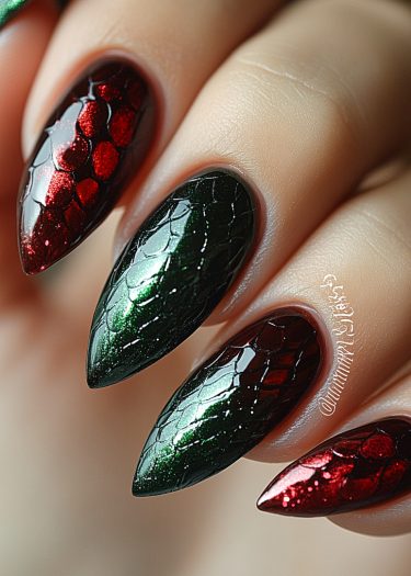 Unique green and red reptilian scale nail art with glossy, metallic finishes and intricate details.