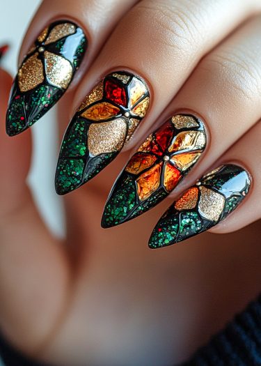 Stunning stained glass nail art with vibrant colors and intricate designs on stiletto nails.