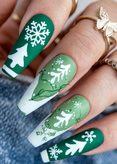 Festive winter holiday nail art featuring elegant green, white, and gold designs with snowflakes and trees.