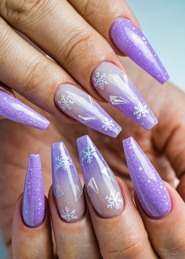 Elegant lilac winter nails with snowflake designs and geometric accents for a stylish manicure.