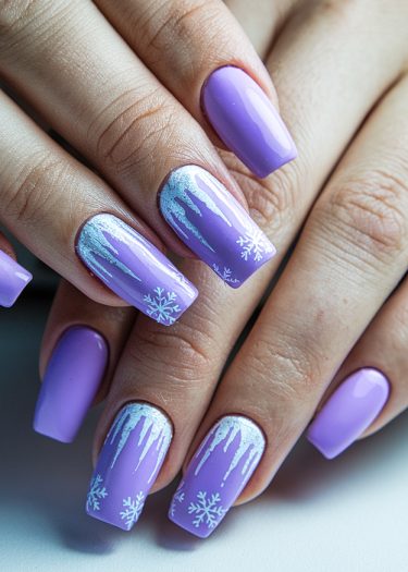 Vibrant lavender winter snowflake nail art with icicle designs for a chic seasonal look.