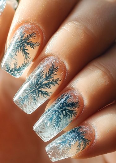 Elegant winter nail art featuring snowflakes and icy designs on manicured square nails.